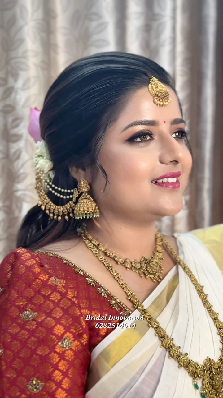 Bridal Innovation portfolio look 6, showing Kerala bridal makeup, hair styling, saree, jewellery, or ceremony details.
